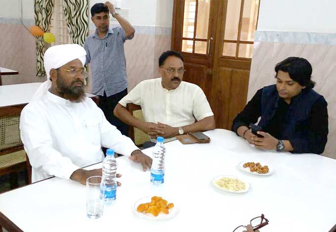 Secular Madrasa office bearers dining together